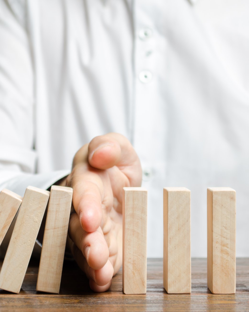 Domino Stop, &copy; stock.adobe.com | Andrii Yalanskyi