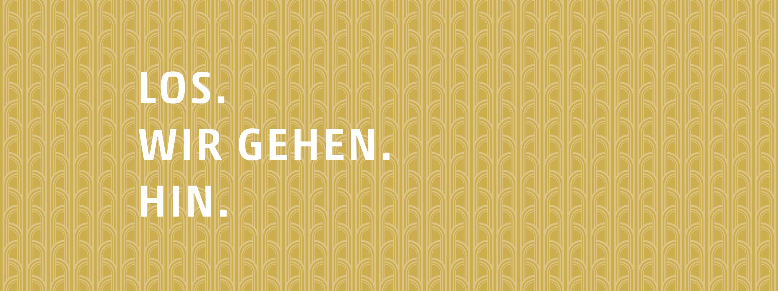 Zu sehen ist ein goldenes Muster, auf dem in weißen Buchstaben die Worte &quot;Los. Wir gehen. Hin.&quot; stehen., © Stadt Bad Salzuflen